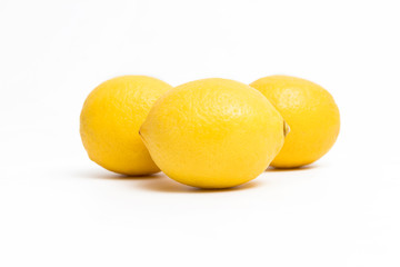 Fresh yellow lemons isolated on white backgrund.