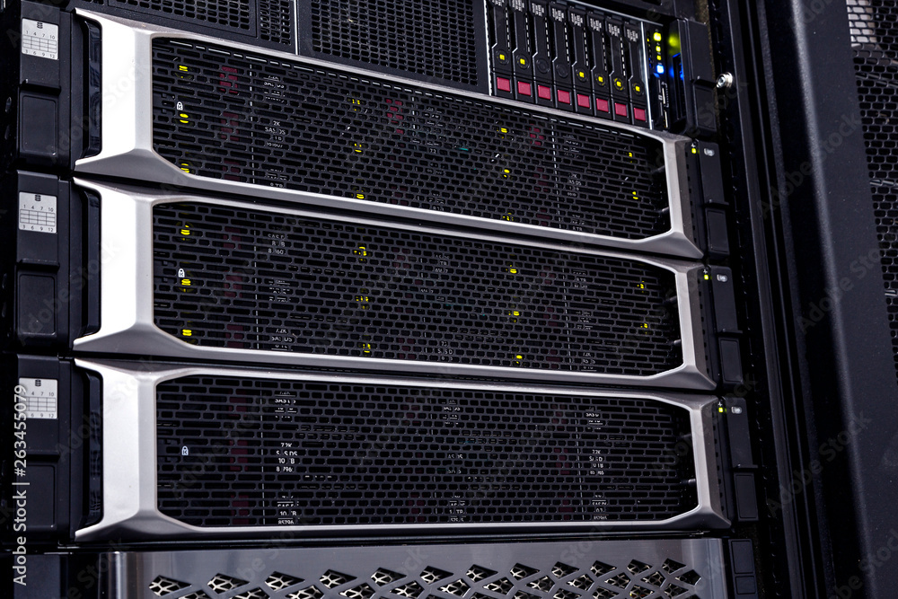 Poster modern mainframe storage in data center close up
