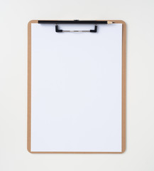 white paper on clipboard isolated on background