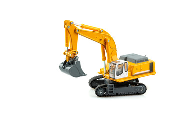 Yellow excavator model toy isolated on white background.