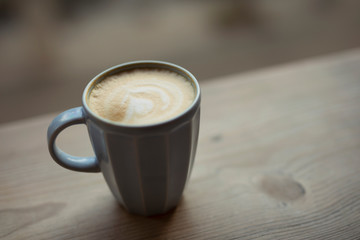 Cup of latte, caffeine beverage