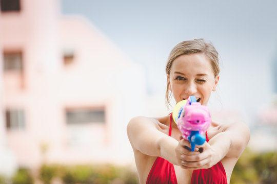 Bikini Woman With Water Gun