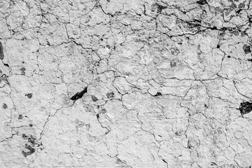 Wall fragment with scratches and cracks