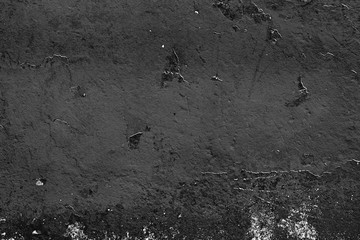 Wall fragment with scratches and cracks