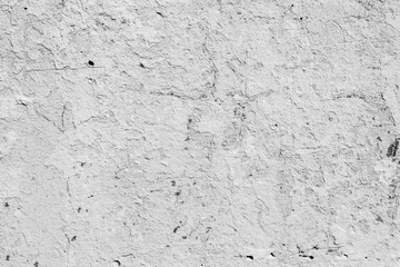 Wall fragment with scratches and cracks