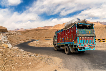 Truck on the high altitude Manali-Leh road in Lahaul valley, state of Himachal Pradesh, Indian Himalayas, India
