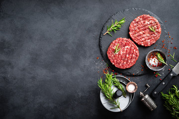 Fresh raw minced beef steak burgers with spices