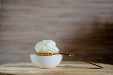 decorated  tasty Cupcake with slice of Strawberry and Chocolate on the table. Horizontal view several objects