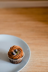 decorated  tasty Cupcake with slice of Strawberry and Chocolate on the table. Horizontal view several objects