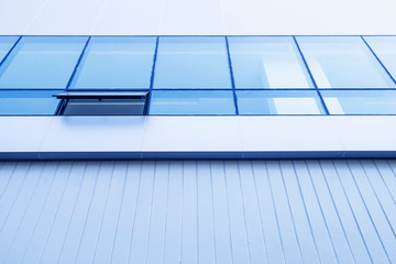 Blue glass windows installed in new buildings.