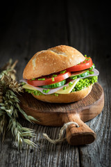 Homemade sandwich with lettuce, tomato and ham