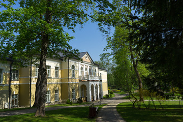 Fototapeta premium Hotel complex surrounded by greenery