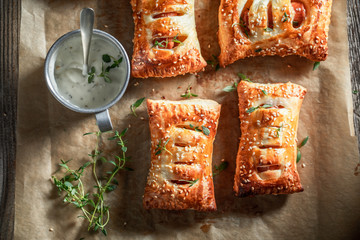 Crispy sausage in puff pastry as a snack for breakfast