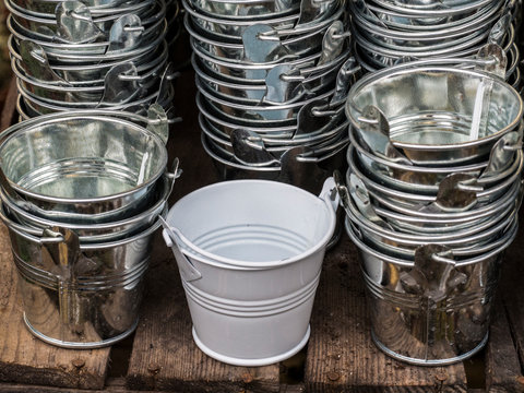 Stacked Silver Metal Buckets