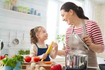 Happy family in the kitchen.