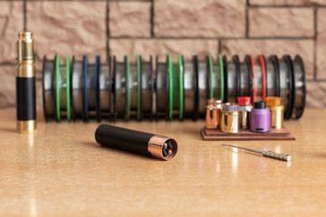Electronic cigarette. Replacing old coils in the RDA atomizer.