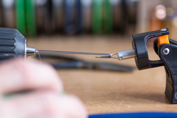 Electronic cigarette. The process of making coils for the atomizer of wire.