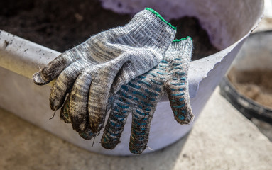 Dirty worker gloves in the garden