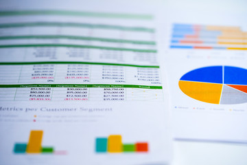 Spreadsheet table paper with graph. Finance development, Banking Account, Statistics Investment Analytic research data economy, trading, Mobile office reporting Business company meeting concept.