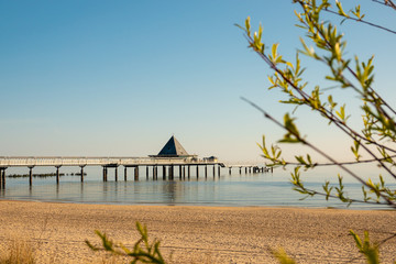  the pier of Ahlbeck in the early morning in sunshine