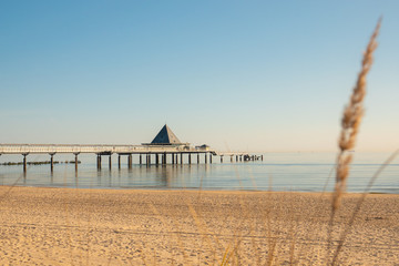  the pier of Ahlbeck in the early morning in sunshine