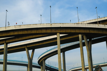 Modern Bhumibol bridge curve road with blue sky in Bangkok