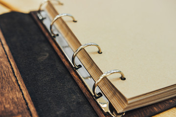 Vintage book made of wood on the rings. binding on the rings. old wooden book. Photoalbum album...