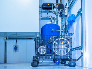 Compressor installation. Belt compressor. Compressor equipped with pressure gauge. Compressed air...