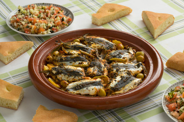 Traditional  Moroccan Tagine with sardines and vegetables