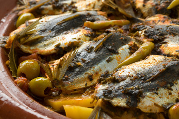 Traditional  Moroccan Tagine with stuffed sardines and vegetables
