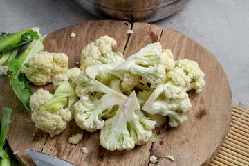 Fresh Cauliflower Prepare for cooking over grey table