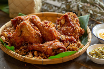Garlic fried chicken over a wooden table