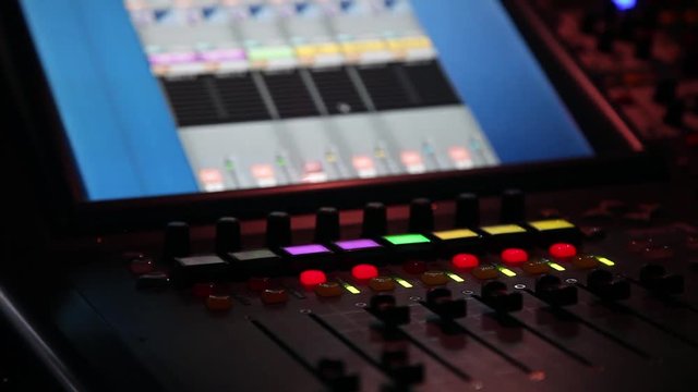 remote recordists closeup. Hand adjusts sound effects. Electric machine on table for working of sound designer or club dj at party in nightclub. Occupation for modern lifestyle, objects for listen at 