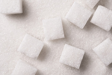 White sugar cubes close up. Crumbly sugar and refined sugar. Sugar cubes.