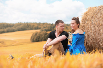 Couple on a walk in the country fields