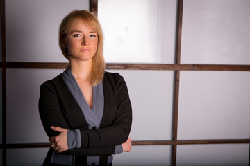 Beautiful young girl in a business suit