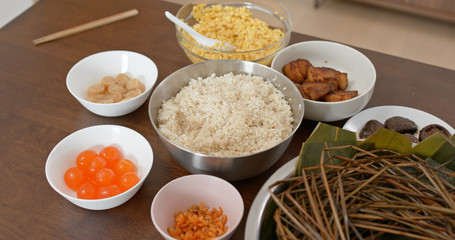 Put food on table and prepare for making rice dumpling