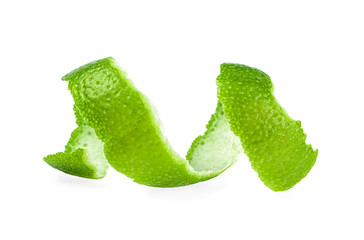 Curly lime peel twist isolated on white background