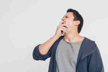 portrait of man thoughtful. Guy with hands on face isolated on white background