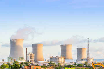 Coal-fired power plants under the blue sky white clouds