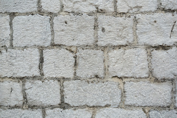pattern gray color of modern style design decorative uneven cracked real stone wall surface with cement