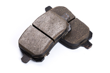 Set of brake pads, car spares isolated on white background
