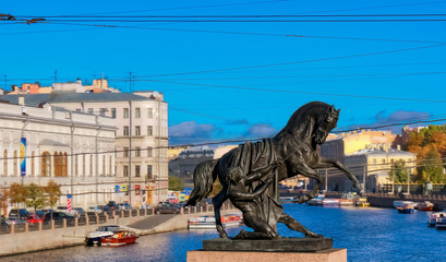 Horse tamers sculpture by Peter Klodt on Anichkov bridge built in 1841 in Saint Petersburg, Russia