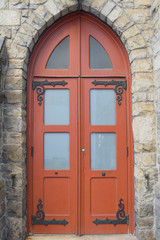 Old Wooden Door in Brick Wall