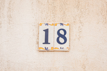 ceramic tile  number eighteen 18 house number 