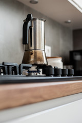 Preparing a traditional italian style coffee with coffee percolator. Making a coffe.