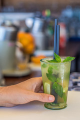 Cold tasty mojito cocktail on the beach