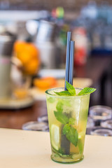 Cold tasty mojito cocktail on the beach