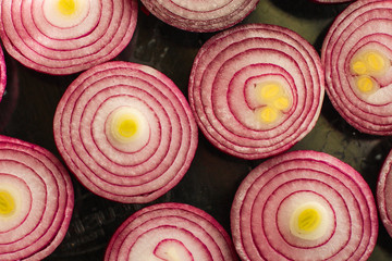 Red onion. juicy fresh vegetable cut, slices. food background. top view