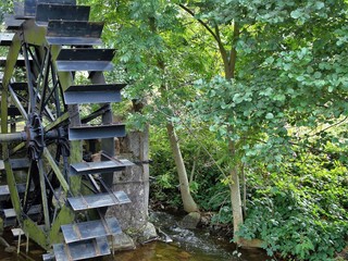 Closeup of an old water mill wheel